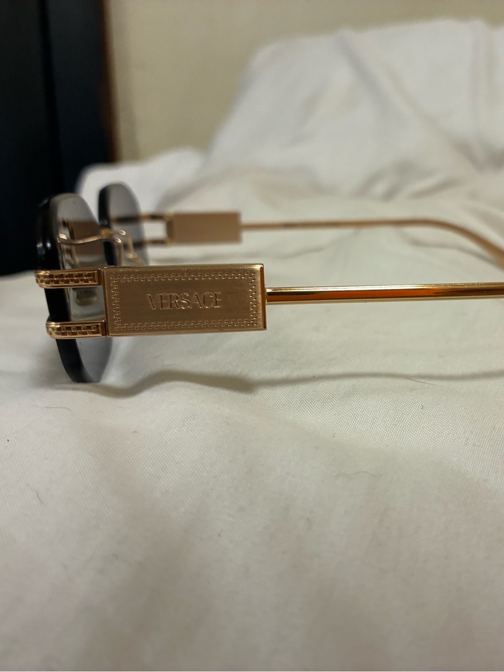 Versace Rimless Black Sunglasses with Gold Accents